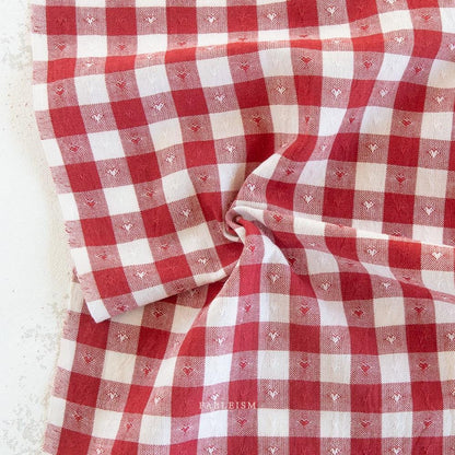 Dobby Hearts Gingham in Cherry by Fableism Fabric sold by 1/2 yard extra wide