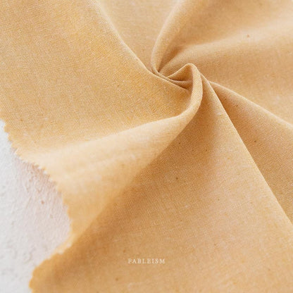 Yellow Sunshine Chambray Fabric by Fableism sold by 1/2 yard | Earthy minimalist Bamboo/Cotton woven fabric for quilting, clothes