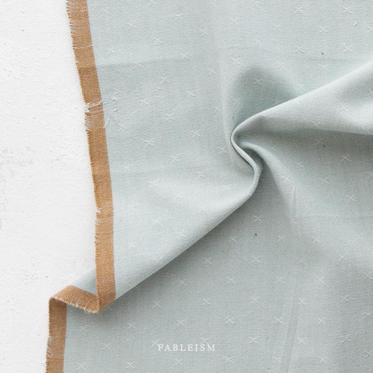 Subtle Texture Arctic blue Fabric by Fableism | Wild Sprout Wovens sold by the 1/2 yard | 100% Cotton woven fabric for quilting, clothes