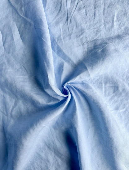 100% lightweight linen in baby blue sold by the 1/2 yard | Sustainable fabric for apparel, great for dresses, tops, pants, etc.