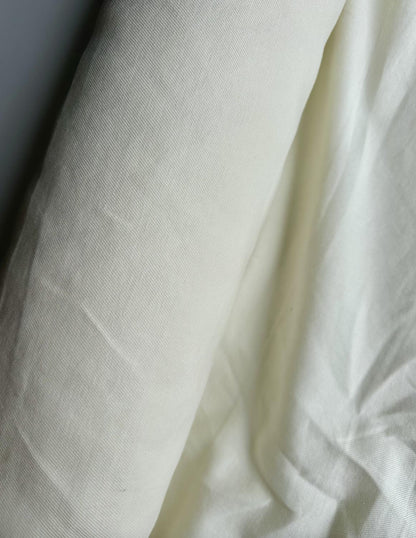 100% lightweight linen in white/cream sold by the 1/2 yard | Sustainable fabric for apparel, great for dresses, tops, pants, etc.