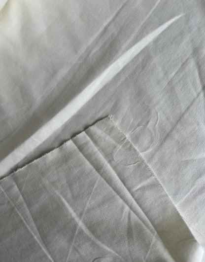 100% lightweight linen in white/cream sold by the 1/2 yard | Sustainable fabric for apparel, great for dresses, tops, pants, etc.
