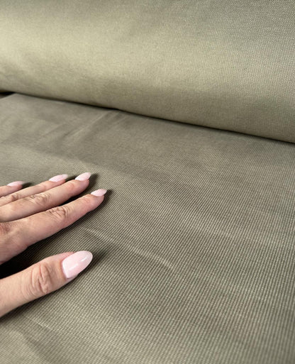 Deadstock pale olive green corduroy fabric sold by the half yard | Structured tightly-woven medium-weight cotton corduroy
